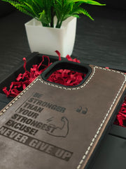 Premium Leather Case for iPhone 16 Pro Back Cover Dark Brown Color With Motivational Quote Never Give Up Engraved by Zinoskins